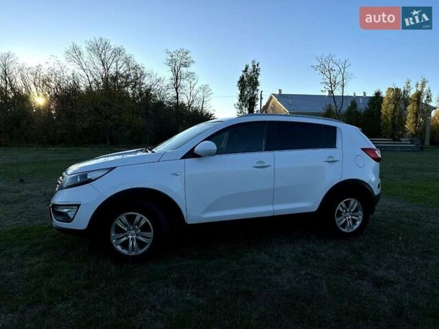 Белый Киа Sportage, объемом двигателя 1.69 л и пробегом 222 тыс. км за 12000 $, фото 18 на Automoto.ua