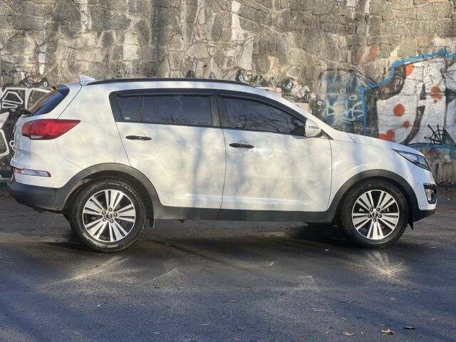 Білий Кіа Sportage, об'ємом двигуна 2 л та пробігом 229 тис. км за 13750 $, фото 9 на Automoto.ua