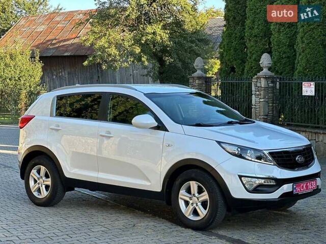 Білий Кіа Sportage, об'ємом двигуна 1.59 л та пробігом 219 тис. км за 12900 $, фото 9 на Automoto.ua