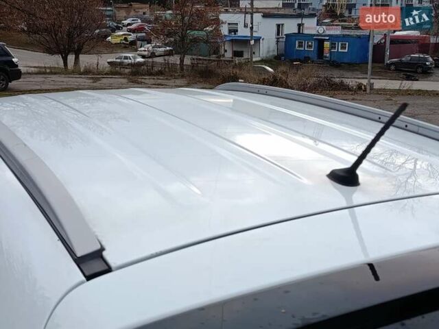 Білий Кіа Sportage, об'ємом двигуна 1.69 л та пробігом 230 тис. км за 14440 $, фото 16 на Automoto.ua