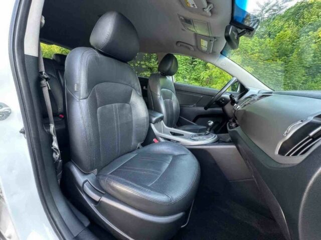 Белый Киа Sportage, объемом двигателя 2 л и пробегом 86 тыс. км за 7600 $, фото 7 на Automoto.ua