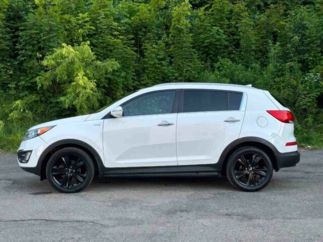 Белый Киа Sportage, объемом двигателя 2 л и пробегом 86 тыс. км за 7600 $, фото 6 на Automoto.ua