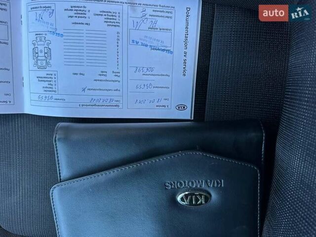 Білий Кіа Sportage, об'ємом двигуна 1.59 л та пробігом 219 тис. км за 12900 $, фото 105 на Automoto.ua