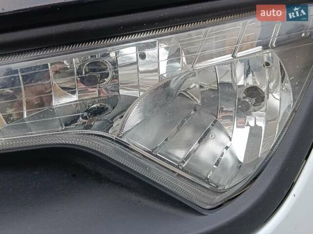 Білий Кіа Sportage, об'ємом двигуна 1.69 л та пробігом 230 тис. км за 14440 $, фото 27 на Automoto.ua