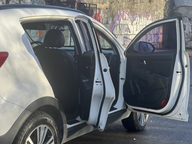Білий Кіа Sportage, об'ємом двигуна 2 л та пробігом 229 тис. км за 13750 $, фото 13 на Automoto.ua