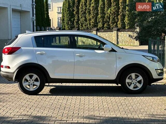 Білий Кіа Sportage, об'ємом двигуна 1.59 л та пробігом 219 тис. км за 12900 $, фото 502 на Automoto.ua