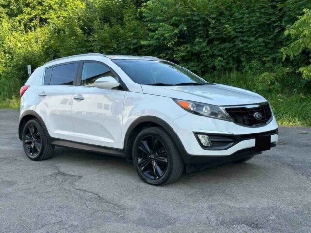 Белый Киа Sportage, объемом двигателя 2 л и пробегом 86 тыс. км за 7600 $, фото 2 на Automoto.ua