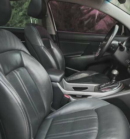 Білий Кіа Sportage, об'ємом двигуна 2 л та пробігом 211 тис. км за 15300 $, фото 24 на Automoto.ua