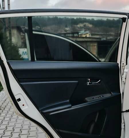 Білий Кіа Sportage, об'ємом двигуна 2 л та пробігом 211 тис. км за 15300 $, фото 62 на Automoto.ua