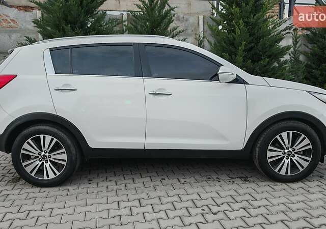 Білий Кіа Sportage, об'ємом двигуна 2 л та пробігом 211 тис. км за 15300 $, фото 7 на Automoto.ua