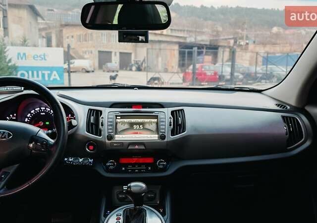 Білий Кіа Sportage, об'ємом двигуна 2 л та пробігом 211 тис. км за 15300 $, фото 57 на Automoto.ua