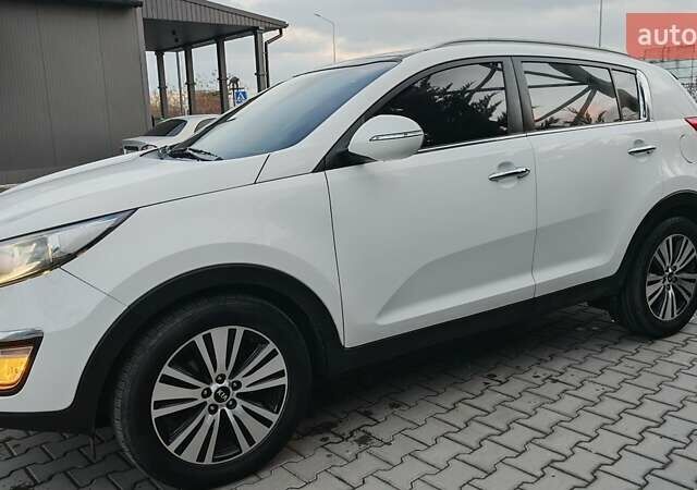 Білий Кіа Sportage, об'ємом двигуна 2 л та пробігом 211 тис. км за 15300 $, фото 10 на Automoto.ua