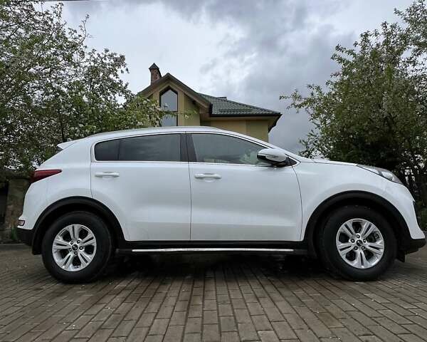 Білий Кіа Sportage, об'ємом двигуна 1.69 л та пробігом 136 тис. км за 15200 $, фото 6 на Automoto.ua