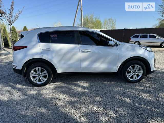 Білий Кіа Sportage, об'ємом двигуна 2 л та пробігом 147 тис. км за 18800 $, фото 3 на Automoto.ua