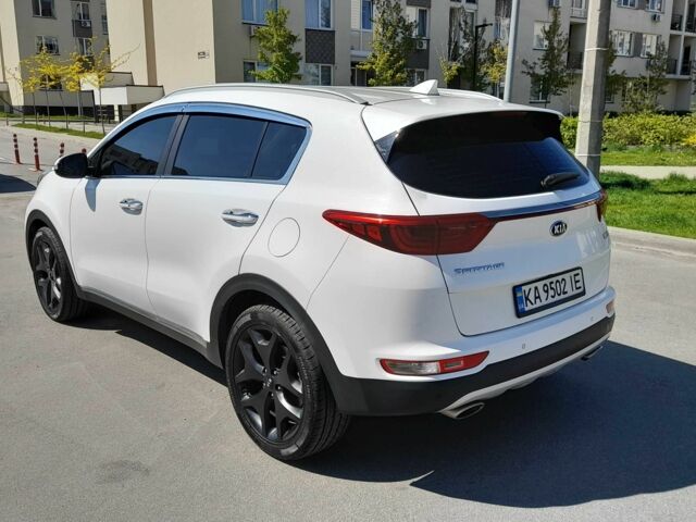 Білий Кіа Sportage, об'ємом двигуна 2 л та пробігом 84 тис. км за 23500 $, фото 6 на Automoto.ua