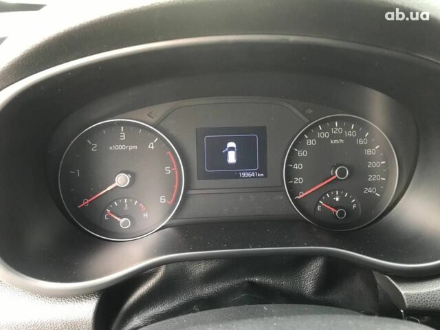 Білий Кіа Sportage, об'ємом двигуна 2 л та пробігом 193 тис. км за 19290 $, фото 14 на Automoto.ua