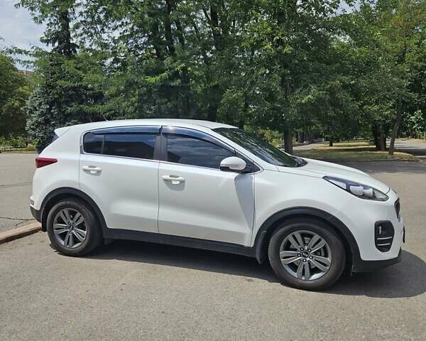 Білий Кіа Sportage, об'ємом двигуна 2 л та пробігом 134 тис. км за 18500 $, фото 18 на Automoto.ua