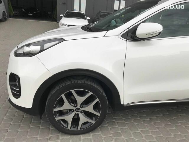 Білий Кіа Sportage, об'ємом двигуна 2 л та пробігом 193 тис. км за 19290 $, фото 12 на Automoto.ua