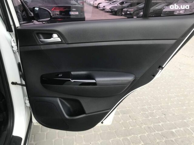 Білий Кіа Sportage, об'ємом двигуна 2 л та пробігом 193 тис. км за 19290 $, фото 15 на Automoto.ua