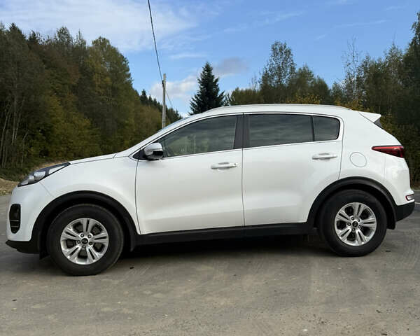 Білий Кіа Sportage, об'ємом двигуна 2 л та пробігом 142 тис. км за 17200 $, фото 1 на Automoto.ua