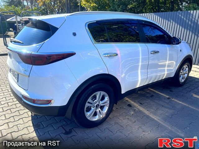 Білий Кіа Sportage, об'ємом двигуна 1.7 л та пробігом 102 тис. км за 16000 $, фото 4 на Automoto.ua
