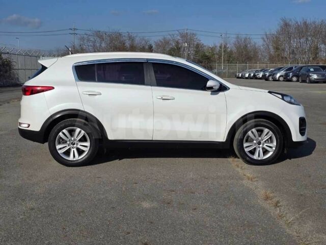 Белый Киа Sportage, объемом двигателя 2 л и пробегом 96 тыс. км за 15000 $, фото 4 на Automoto.ua