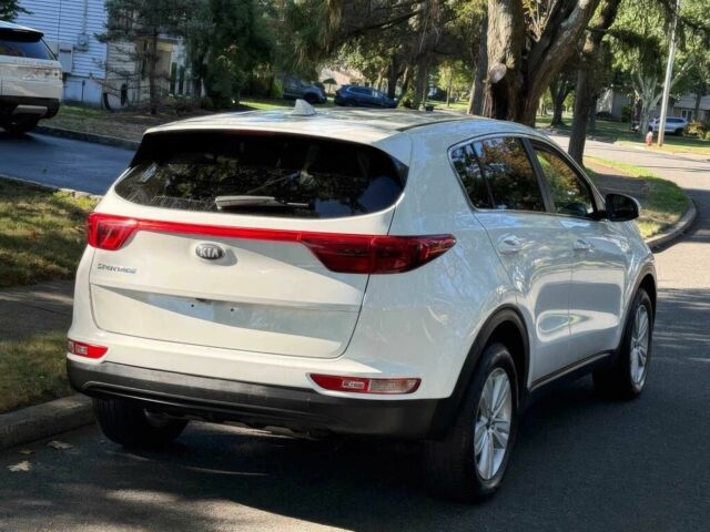 Белый Киа Sportage, объемом двигателя 2.4 л и пробегом 34 тыс. км за 13000 $, фото 4 на Automoto.ua