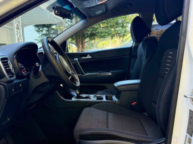 Белый Киа Sportage, объемом двигателя 2.4 л и пробегом 34 тыс. км за 13000 $, фото 8 на Automoto.ua