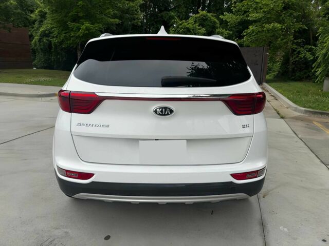 Білий Кіа Sportage, об'ємом двигуна 2.4 л та пробігом 48 тис. км за 10900 $, фото 5 на Automoto.ua