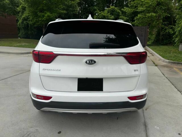 Белый Киа Sportage, объемом двигателя 2.4 л и пробегом 48 тыс. км за 7000 $, фото 5 на Automoto.ua