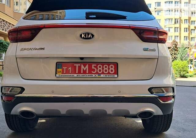 Білий Кіа Sportage, об'ємом двигуна 2 л та пробігом 131 тис. км за 22800 $, фото 4 на Automoto.ua