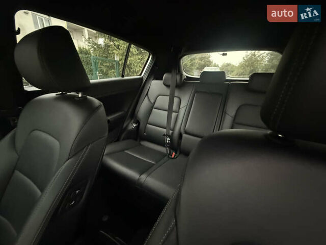 Білий Кіа Sportage, об'ємом двигуна 2 л та пробігом 94 тис. км за 24300 $, фото 14 на Automoto.ua