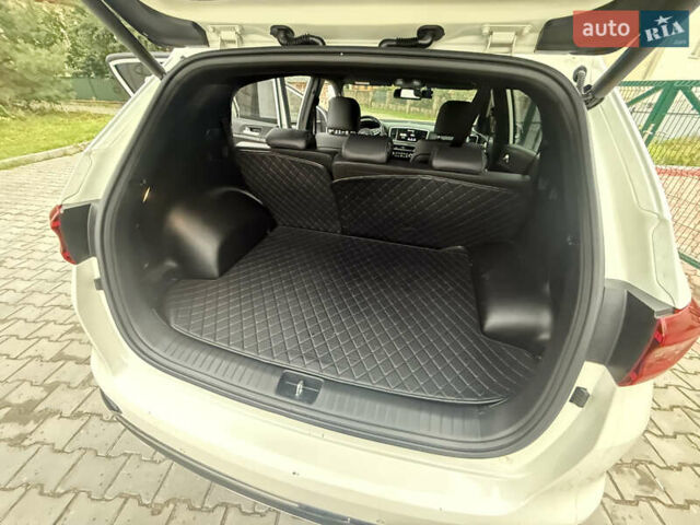 Білий Кіа Sportage, об'ємом двигуна 2 л та пробігом 94 тис. км за 24300 $, фото 10 на Automoto.ua