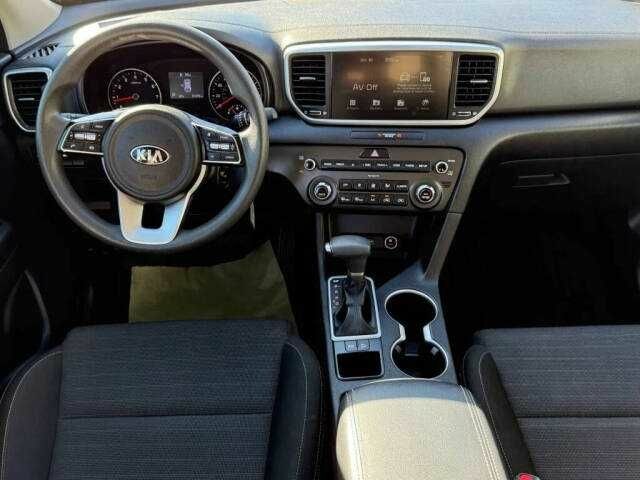 Белый Киа Sportage, объемом двигателя 2.4 л и пробегом 34 тыс. км за 4300 $, фото 5 на Automoto.ua