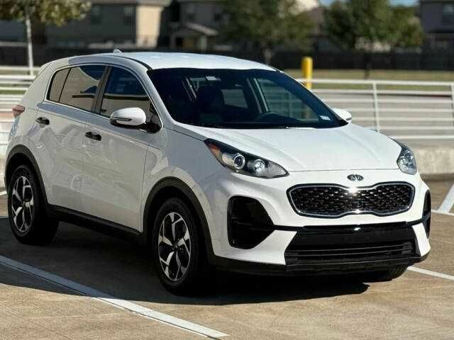 Белый Киа Sportage, объемом двигателя 2.4 л и пробегом 34 тыс. км за 4300 $, фото 3 на Automoto.ua