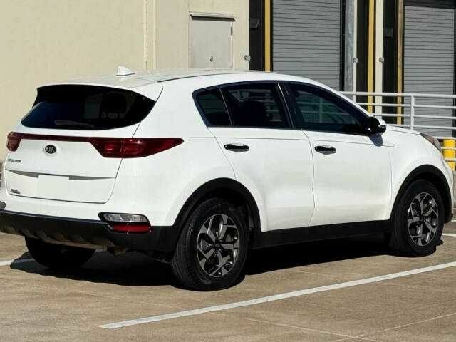 Белый Киа Sportage, объемом двигателя 2.4 л и пробегом 34 тыс. км за 4300 $, фото 2 на Automoto.ua