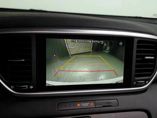 Білий Кіа Sportage, об'ємом двигуна 2 л та пробігом 54 тис. км за 20000 $, фото 8 на Automoto.ua