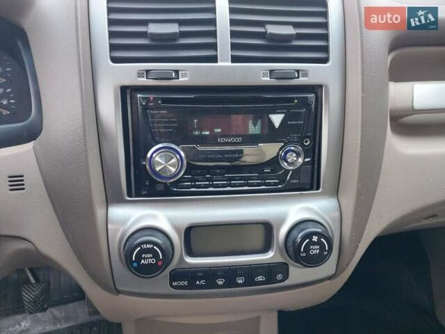 Бежевый Киа Sportage, объемом двигателя 1.98 л и пробегом 184 тыс. км за 6500 $, фото 25 на Automoto.ua