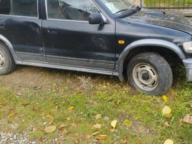 Черный Киа Sportage, объемом двигателя 2 л и пробегом 111 тыс. км за 1599 $, фото 2 на Automoto.ua