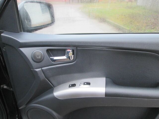 Черный Киа Sportage, объемом двигателя 2 л и пробегом 213 тыс. км за 7700 $, фото 12 на Automoto.ua