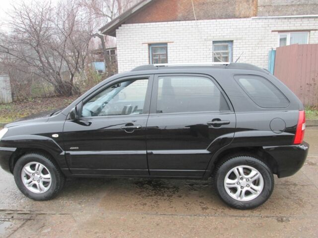 Черный Киа Sportage, объемом двигателя 2 л и пробегом 213 тыс. км за 7700 $, фото 6 на Automoto.ua