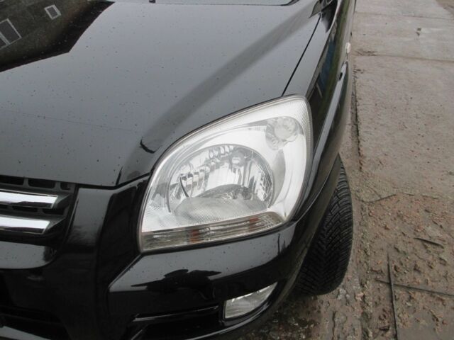 Черный Киа Sportage, объемом двигателя 2 л и пробегом 213 тыс. км за 7700 $, фото 10 на Automoto.ua