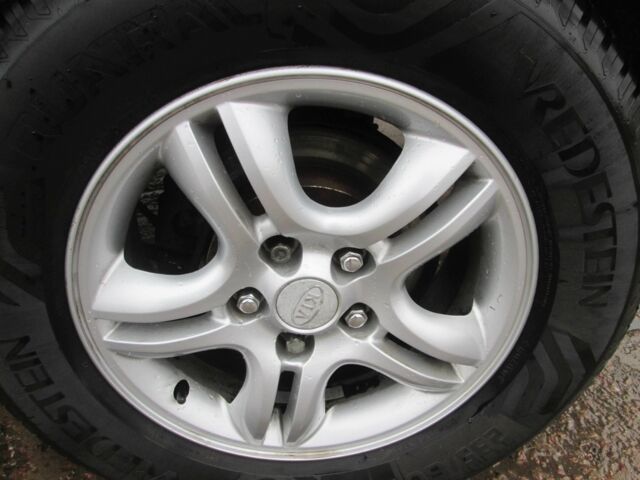 Черный Киа Sportage, объемом двигателя 2 л и пробегом 213 тыс. км за 7700 $, фото 7 на Automoto.ua