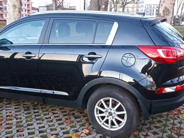 Чорний Кіа Sportage, об'ємом двигуна 2 л та пробігом 256 тис. км за 13350 $, фото 4 на Automoto.ua