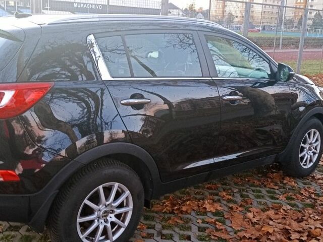 Чорний Кіа Sportage, об'ємом двигуна 2 л та пробігом 256 тис. км за 13350 $, фото 2 на Automoto.ua
