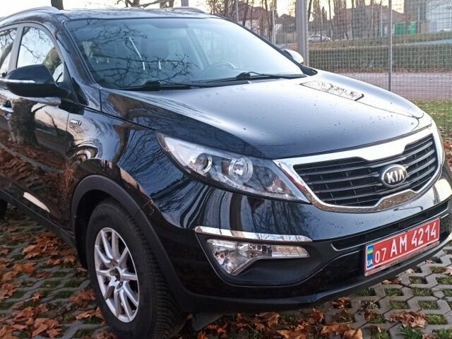 Чорний Кіа Sportage, об'ємом двигуна 2 л та пробігом 256 тис. км за 13350 $, фото 1 на Automoto.ua