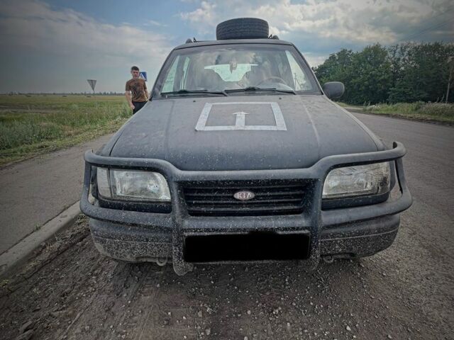 Черный Киа Sportage, объемом двигателя 2 л и пробегом 240 тыс. км за 2000 $, фото 1 на Automoto.ua