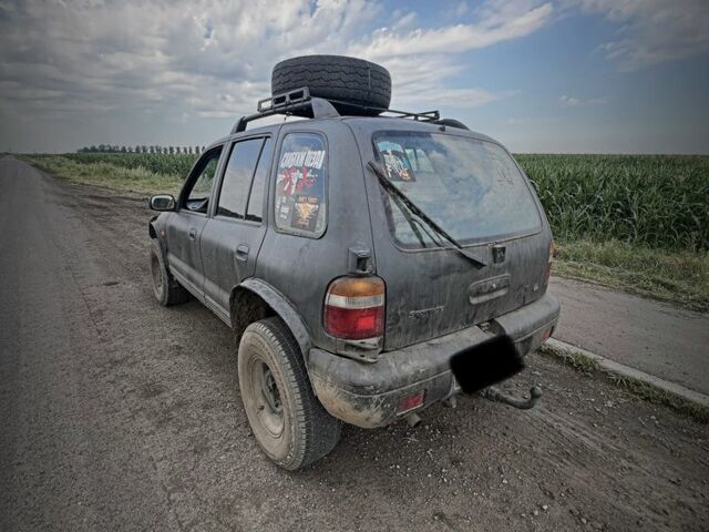 Черный Киа Sportage, объемом двигателя 2 л и пробегом 240 тыс. км за 2000 $, фото 2 на Automoto.ua