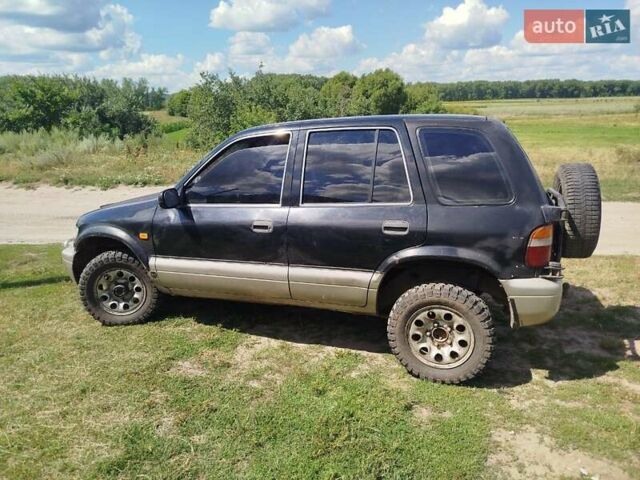 Черный Киа Sportage, объемом двигателя 2 л и пробегом 350 тыс. км за 3000 $, фото 5 на Automoto.ua