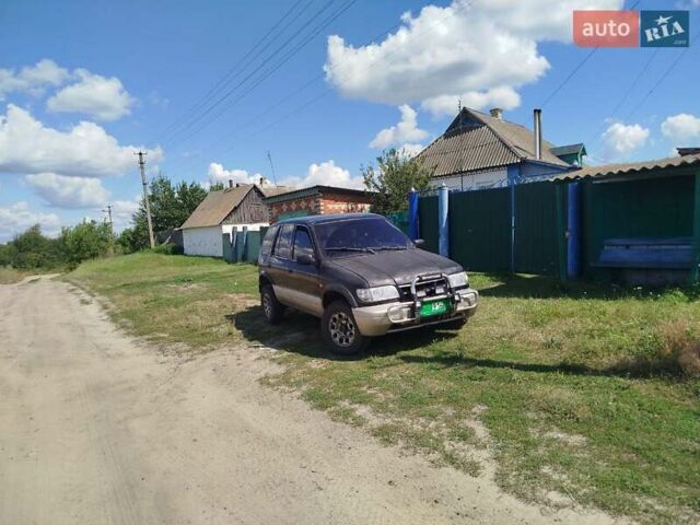 Черный Киа Sportage, объемом двигателя 2 л и пробегом 350 тыс. км за 3000 $, фото 4 на Automoto.ua